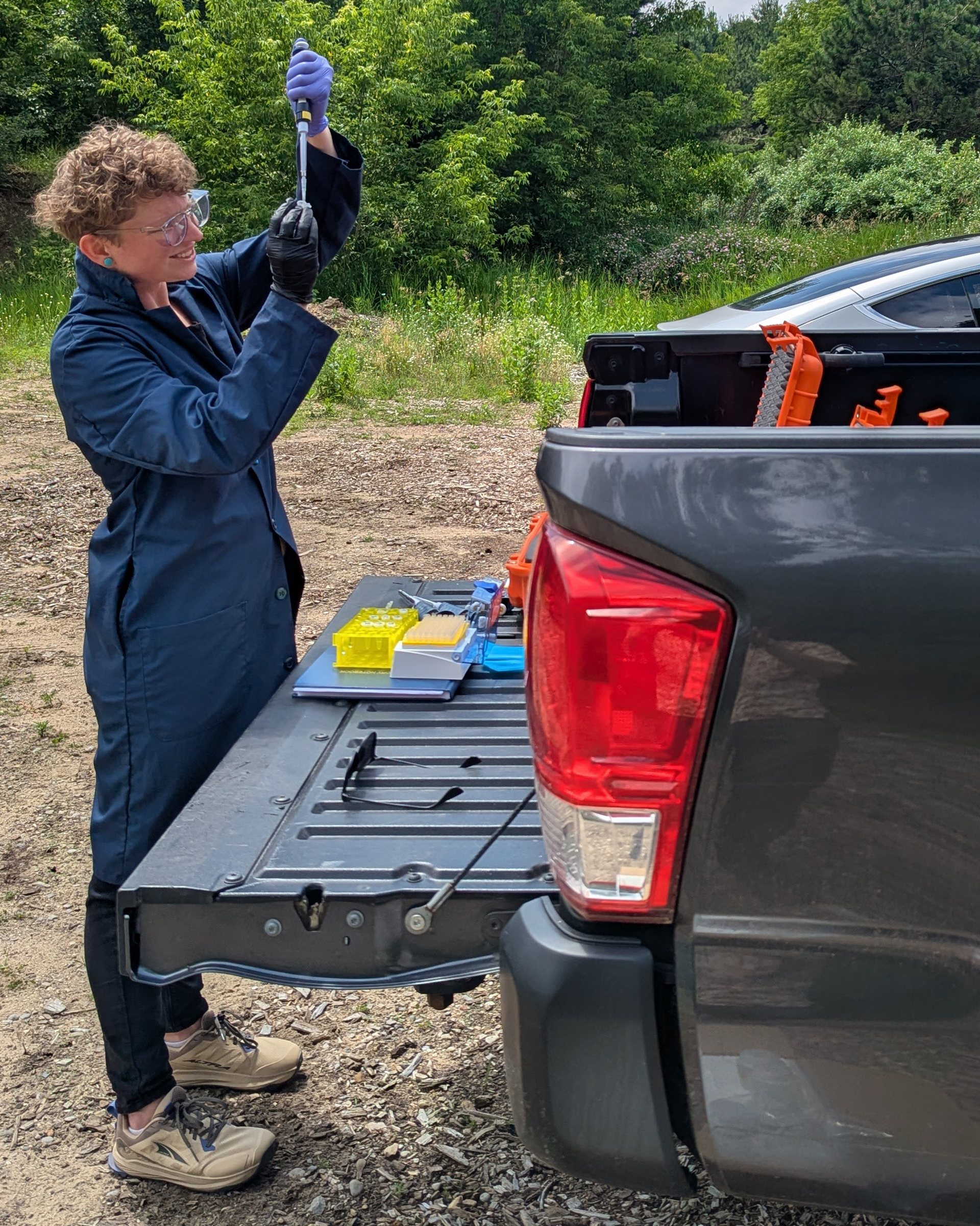 Stephanie Baklarz, research scientist with Wave Lumina, testing PFAS levels in the field with the PFAS field sensor prototype under development. 