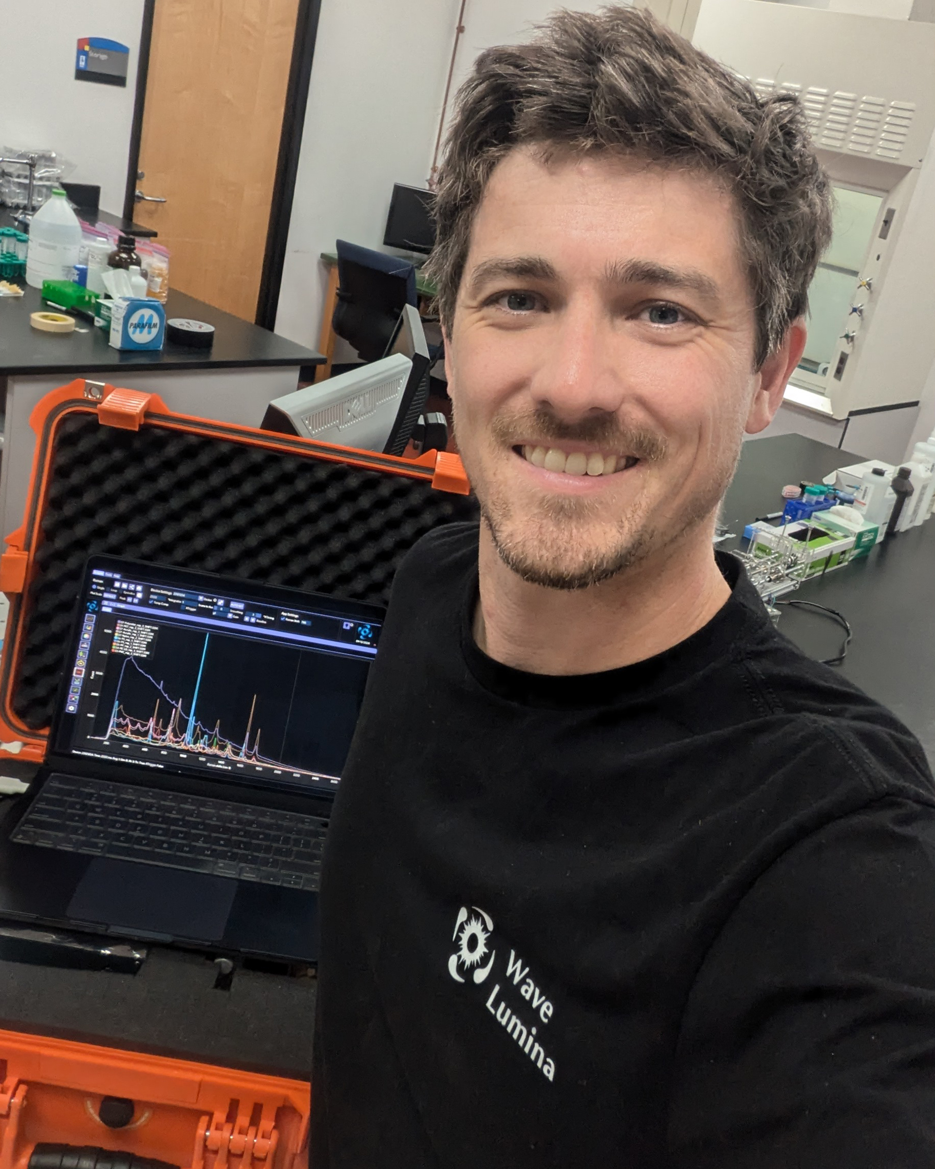 Wave Lumina CEO Vernon Lalone with the PFAS field sensor prototype.  